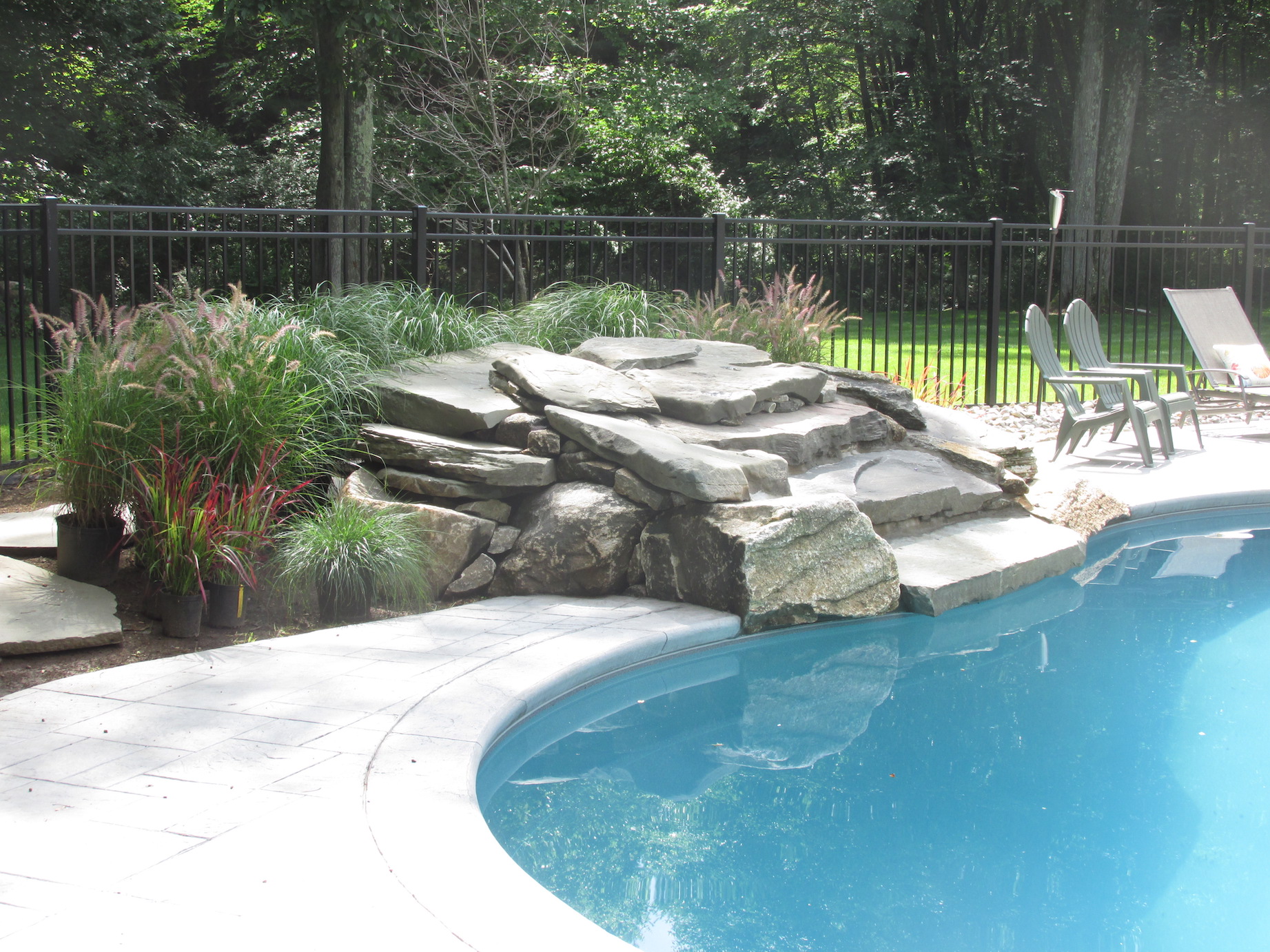 Decorative water feature used as a focal point in a residential landscape